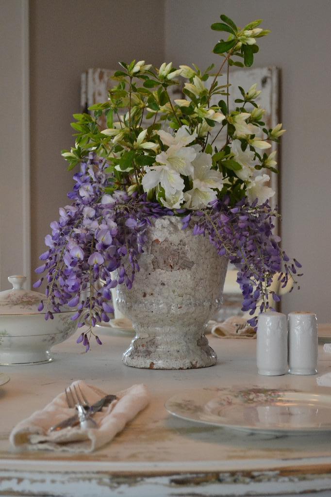 a whimsical centerpiece with fresh garden flowers