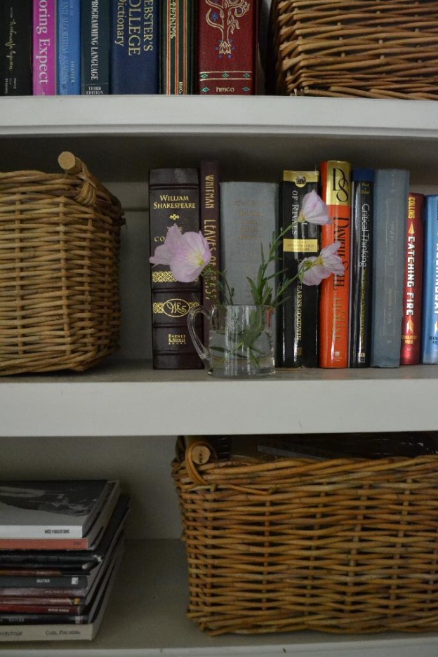 organize your bookcase with baskets and lace cottage fix