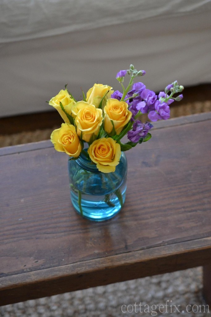 Cottage Fix blog - yellow roses in a blue Ball jar