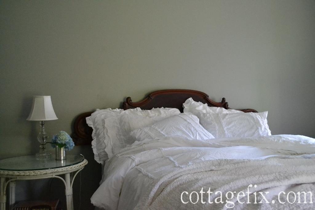 Cottage Fix blog - architectural salvage headboard and fluffy white bedding