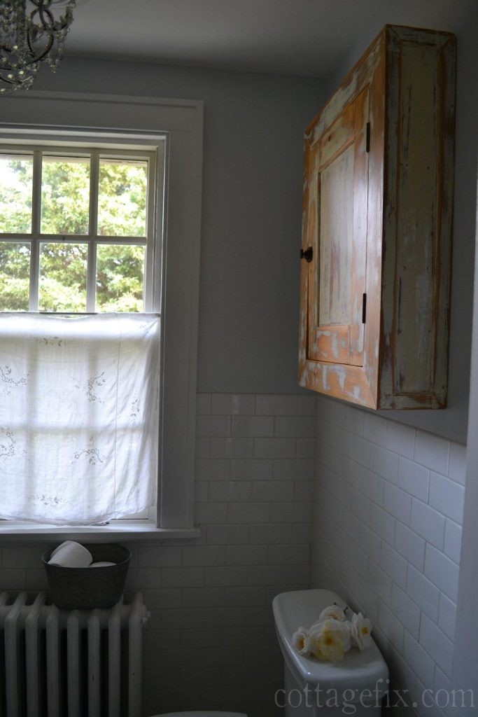 Cottage Fix blog - vintage bathroom cabinet and linen window treatment