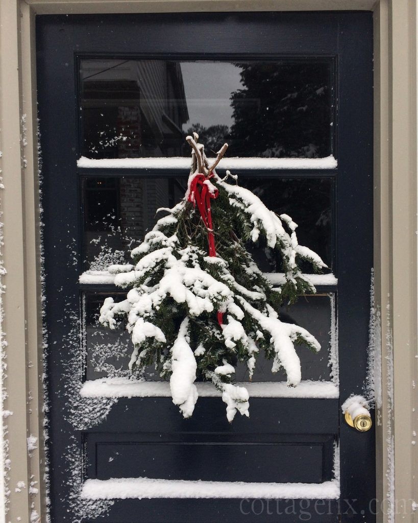 Cottage Fix blog - door decoration covered in snow