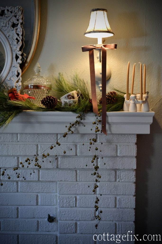 Cottage Fix blog - Christmas 2025 mantel with faux pine garland and blush velvet ribbon